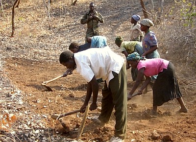 Villagers supporting the Electric fence project